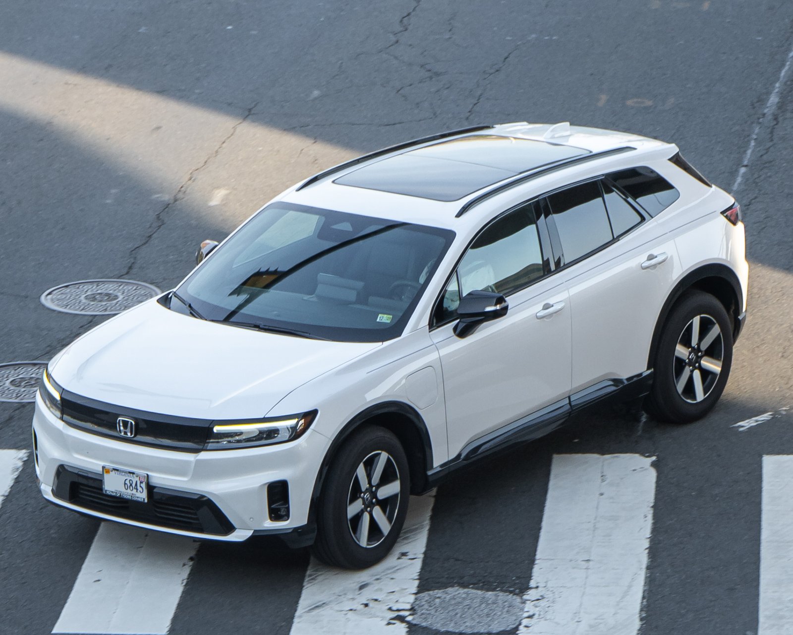 Honda Prologue electric SUV parked on a city street